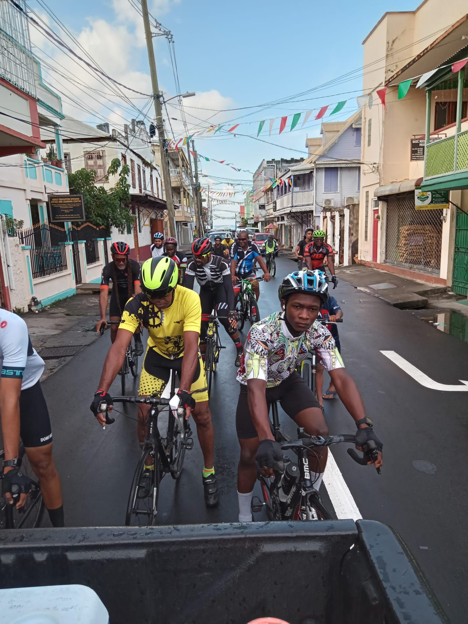 Members of the Dominica Cycling Association and other riders participate in a cycling awareness Fun Ride in Roseau, Dominica, on November 11, 2023.