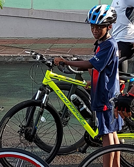 A young cyclist stands ready to participate in the Dominica Cycling Association's safety awareness Fun Ride in Roseau on November 11, 2023.